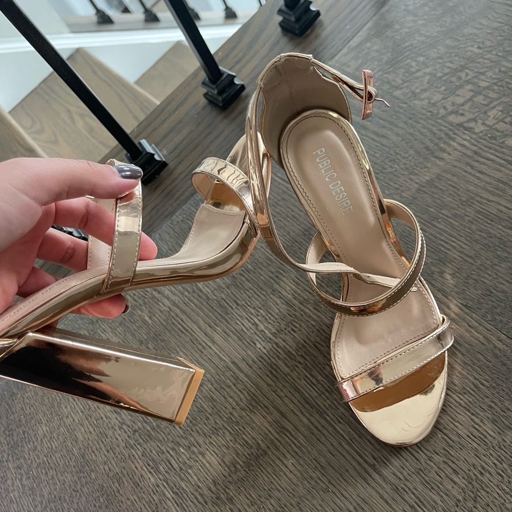 Public desire heels in gold
